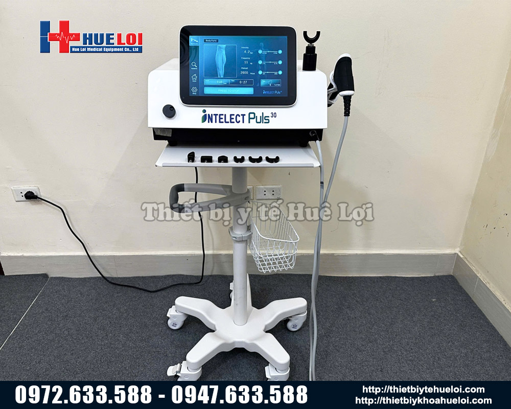 máy xung kích trị liệu kết hợp tác động cột sống